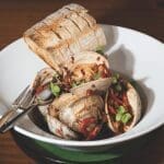 dish by Adrift with clams and bread