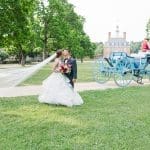Wedding Couple in front of Palace Carriage. Photo by Mattie Wezah Photography