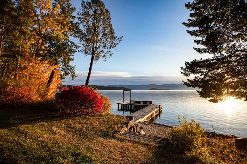 Fall lake view with a dock
