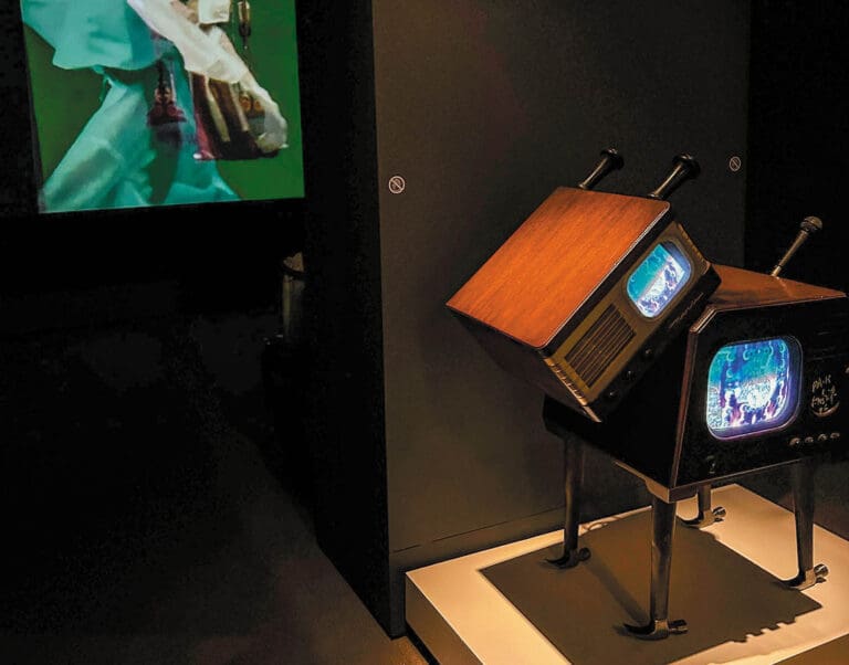 WOOF, WOOF "Dogmatic" by Nam June Paik, created in 1996. Nam June Paik (1932-2006) was a Korean-born artist considered a pioneer and the "father of video art."