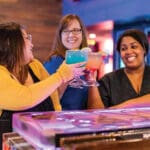 Cinema Cafe, ladies drinking cocktails at the movie theater