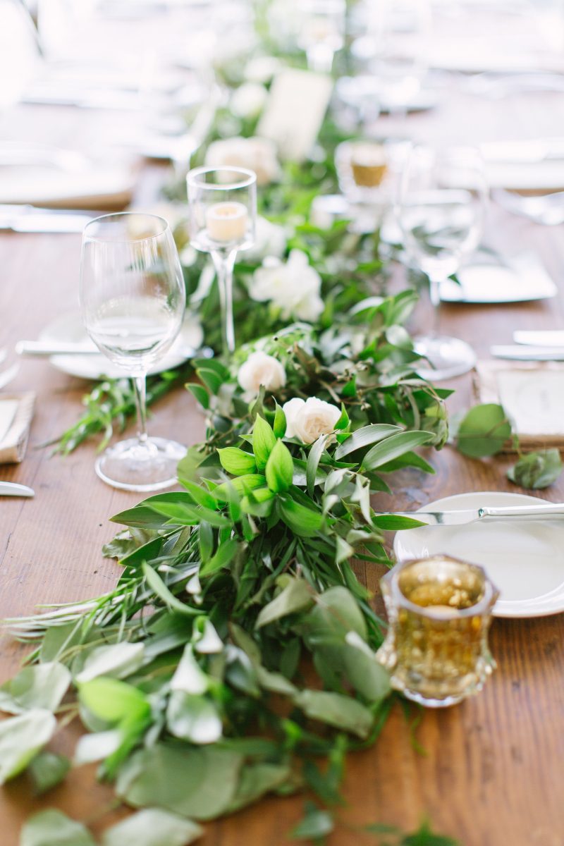 Gobs of Green Flower Arrangement on table, wedding